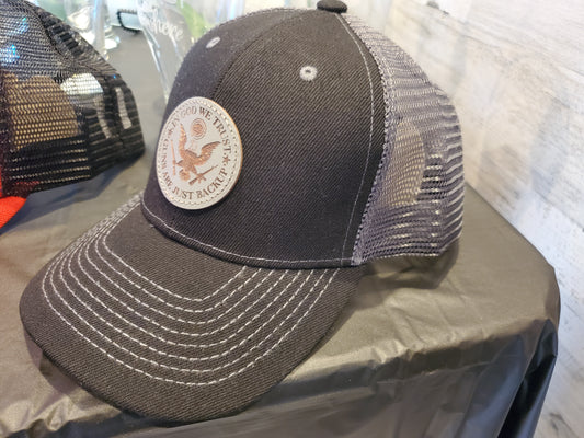 Black Trucker Hat with Laser Engraved Gray Round Leather Patch