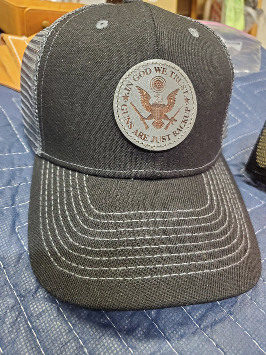 Black Trucker Hat with Laser Engraved Gray Round Leather Patch